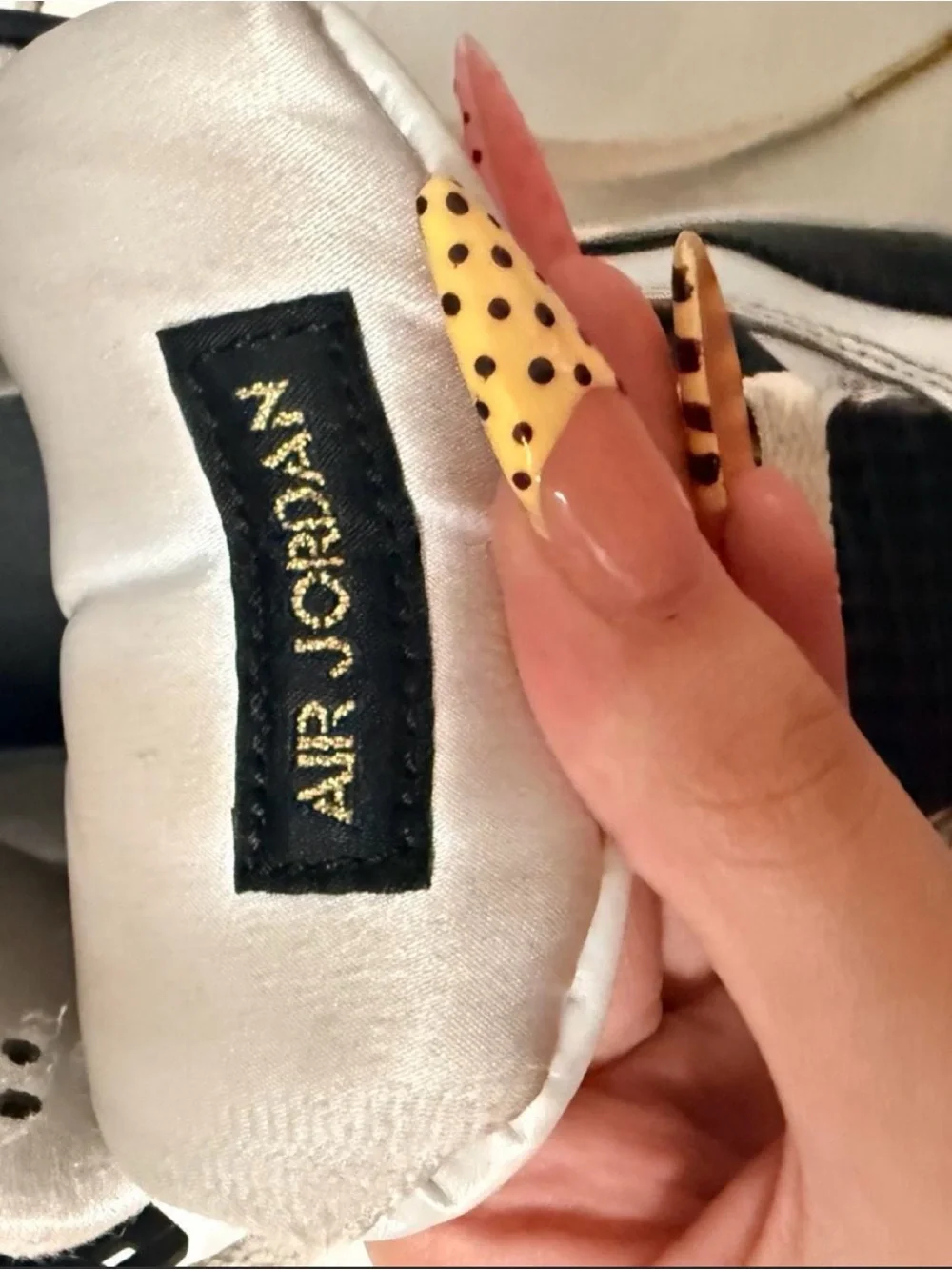 Jordan Retro Sneakers in White, Black & Gold Accents
